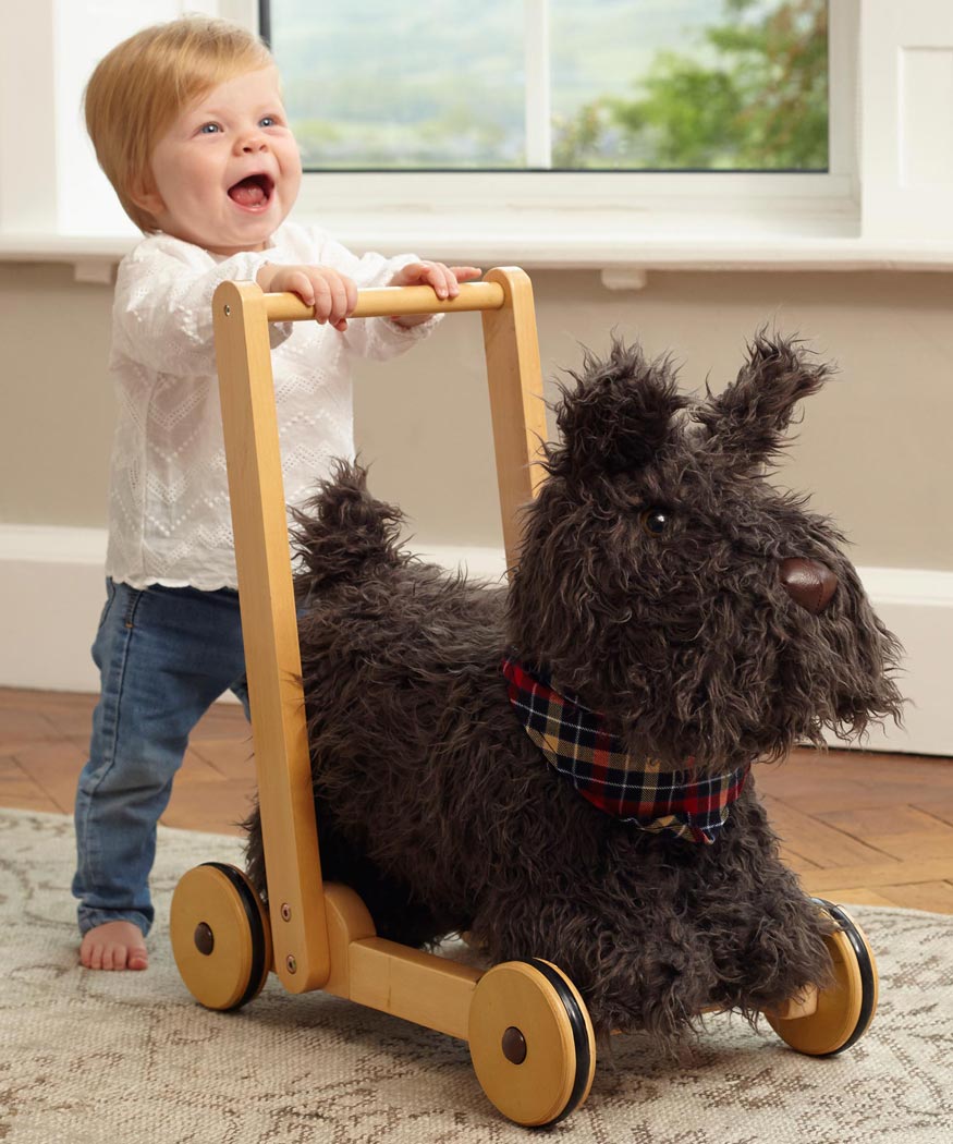 Lauflernspielzeug Hund mit Holzgestell und Rollen